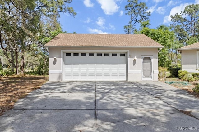 3563 W Blossom Dr, Beverly Hills, FL 34465 - garage featuring driveway