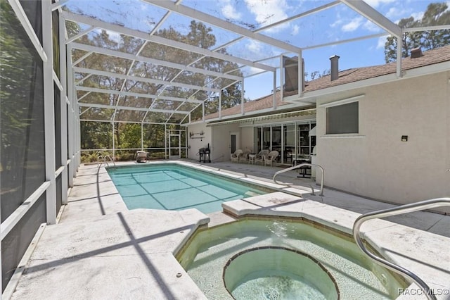 3563 W Blossom Dr, Beverly Hills, FL 34465 - view of pool featuring a patio area, a lanai, and a pool with connected hot tub