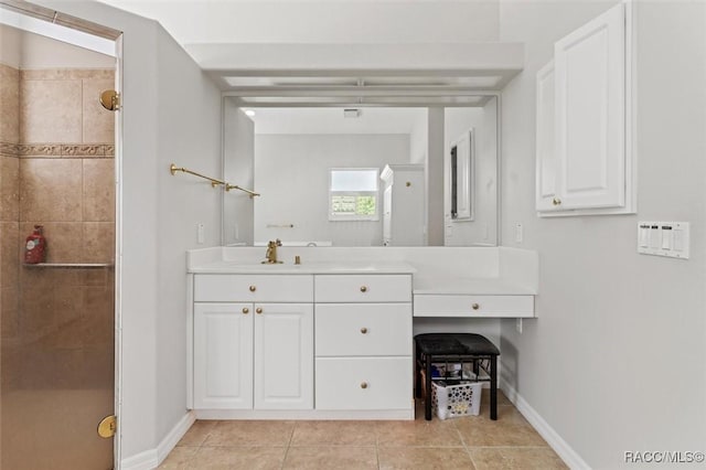 3563 W Blossom Dr, Beverly Hills, FL 34465 - full bathroom with a shower stall, vanity, baseboards, and tile patterned flooring