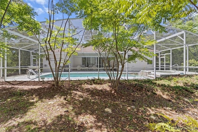 3563 W Blossom Dr, Beverly Hills, FL 34465 - outdoor pool with a lanai and a patio area