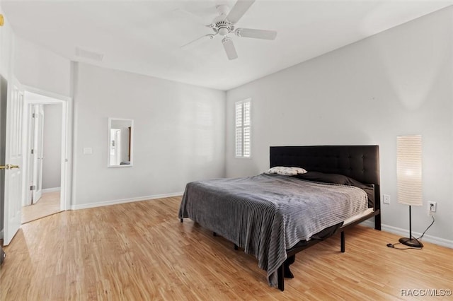 3563 W Blossom Dr, Beverly Hills, FL 34465 - bedroom with light wood-style flooring, baseboards, and ceiling fan