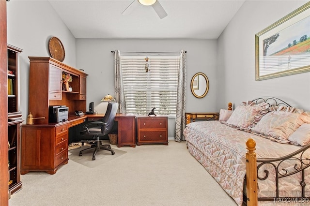 bedroom featuring light carpet and ceiling fan