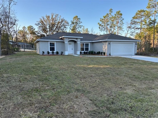 ranch-style house featuring a garage, a front yard, driveway, and stucco siding