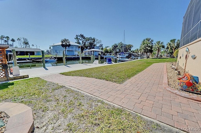 exterior space featuring a water view and a dock