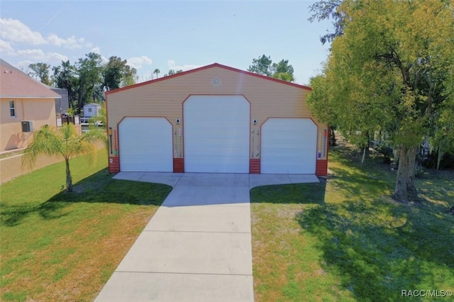 garage with a lawn