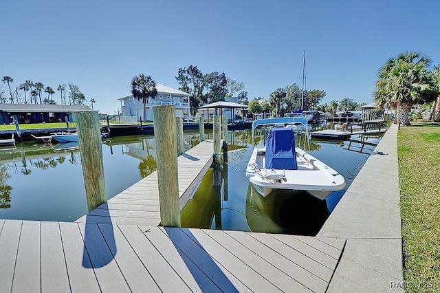 view of dock with a water view