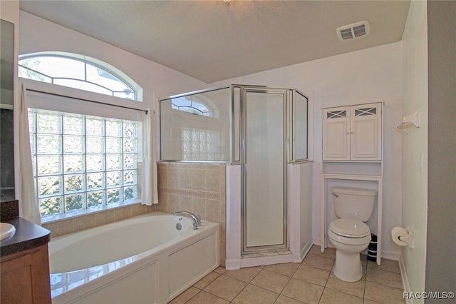 full bathroom featuring toilet, vanity, tile patterned floors, and plus walk in shower