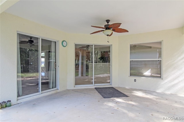 view of patio / terrace featuring ceiling fan