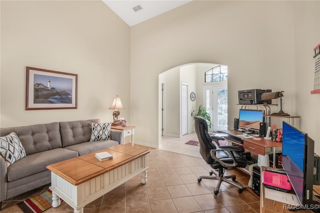 tiled office space with high vaulted ceiling