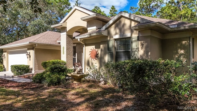 view of front of house with a garage