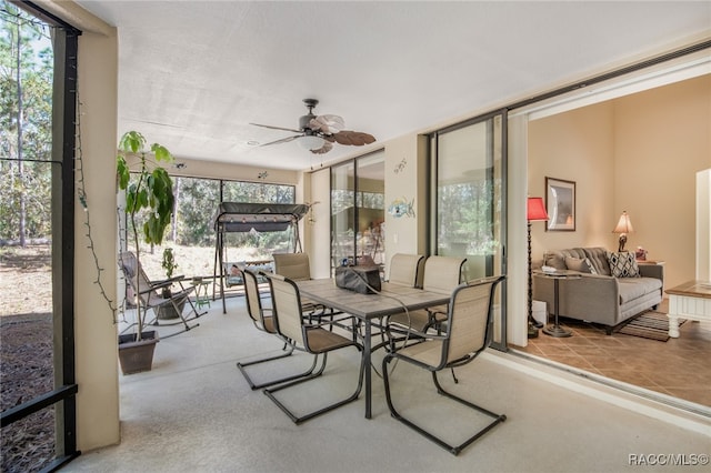 sunroom / solarium with ceiling fan