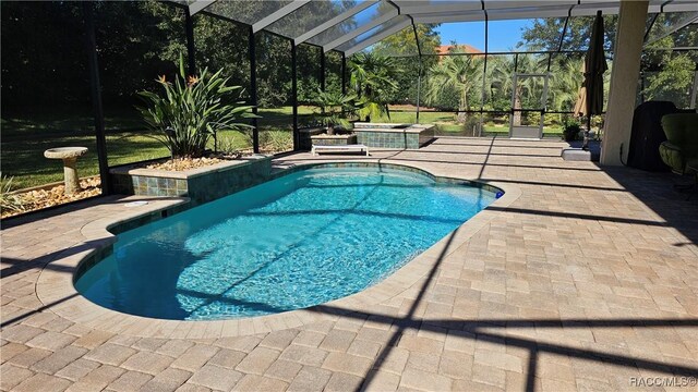 1626 N Eagle Ridge Path, Hernando, FL 34442 - outdoor pool featuring a hot tub, a patio, and a lanai