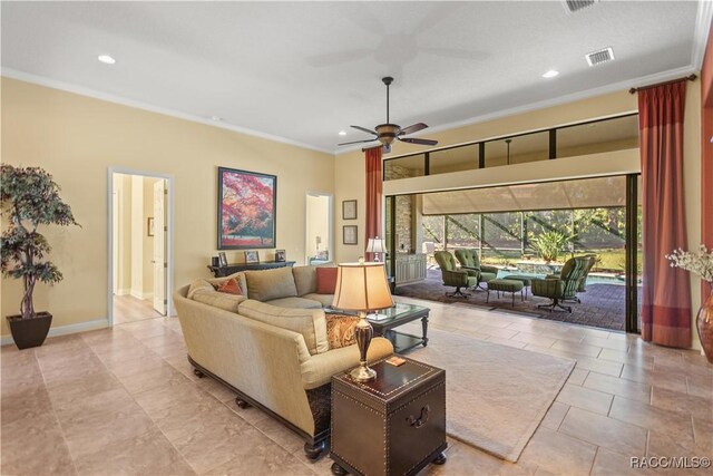1626 N Eagle Ridge Path, Hernando, FL 34442 - living room featuring crown molding, ceiling fan, recessed lighting, baseboards, and light tile patterned floors