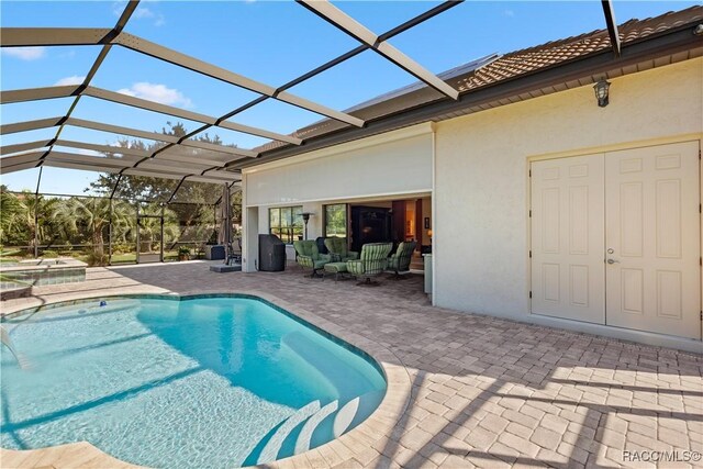 1626 N Eagle Ridge Path, Hernando, FL 34442 - outdoor pool featuring a patio area and glass enclosure