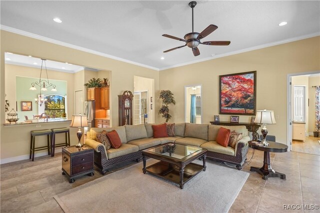 1626 N Eagle Ridge Path, Hernando, FL 34442 - living area featuring recessed lighting, ceiling fan, baseboards, ornamental molding, and a chandelier