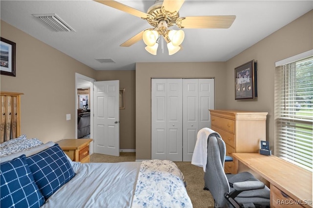 bedroom with carpet flooring, a closet, and ceiling fan