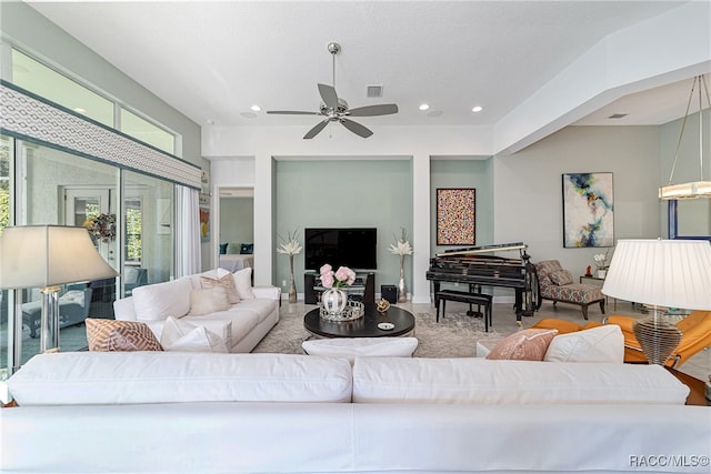 living room with ceiling fan