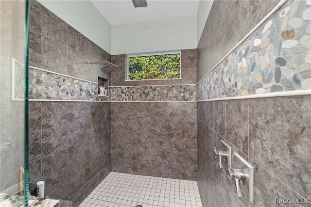 bathroom featuring tiled shower