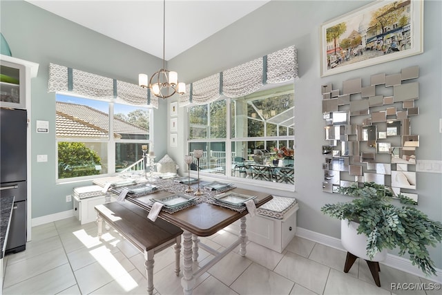 sunroom with a notable chandelier