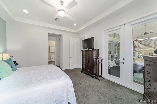 bedroom with carpet flooring, french doors, access to outside, a raised ceiling, and ceiling fan