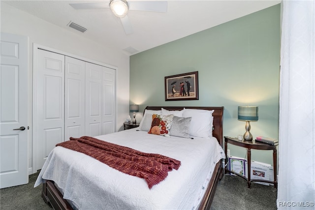 carpeted bedroom with a closet and ceiling fan