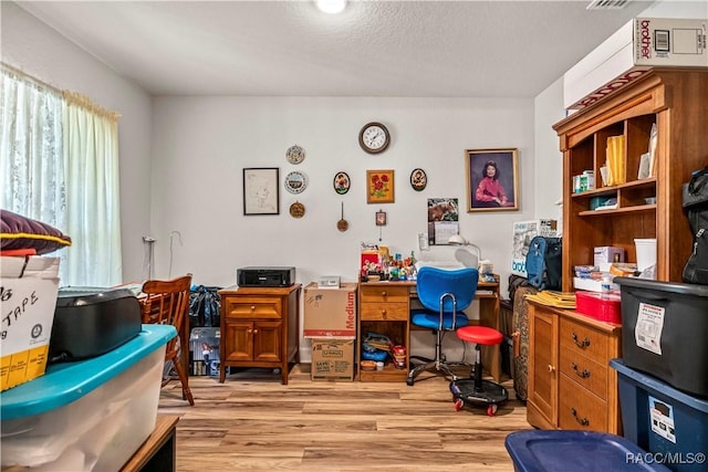 home office featuring light wood-type flooring