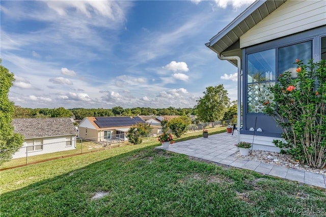 view of yard featuring a patio and a fenced backyard