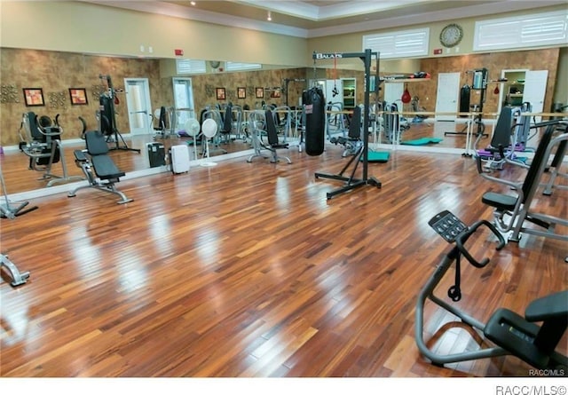 gym with wood-type flooring