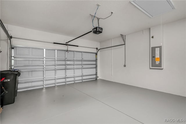 garage featuring a garage door opener and electric panel