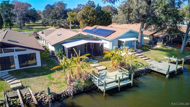 exterior space with a water view