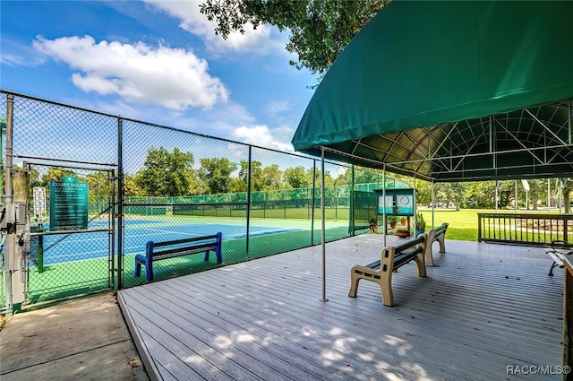 exterior space featuring tennis court