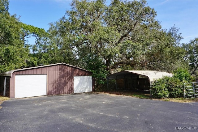 garage with a carport