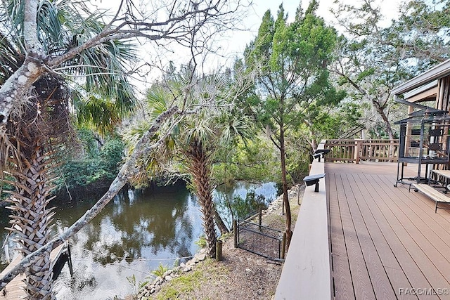 deck featuring a water view