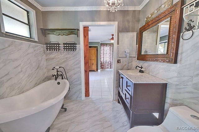 full bath with toilet, marble finish floor, ornamental molding, and tile walls