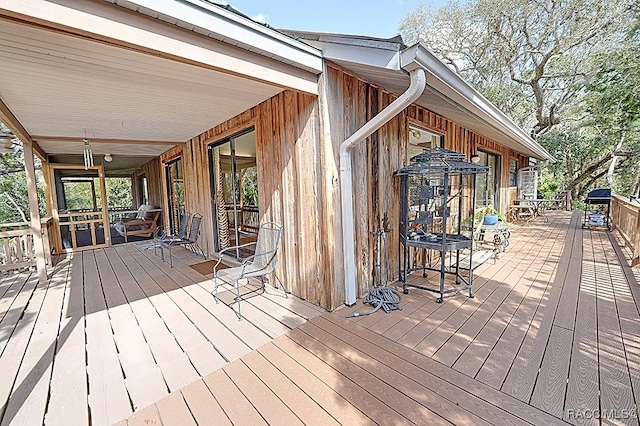 wooden terrace with grilling area