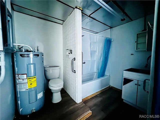 full bathroom featuring electric water heater, sink, hardwood / wood-style flooring, toilet, and tub / shower combination