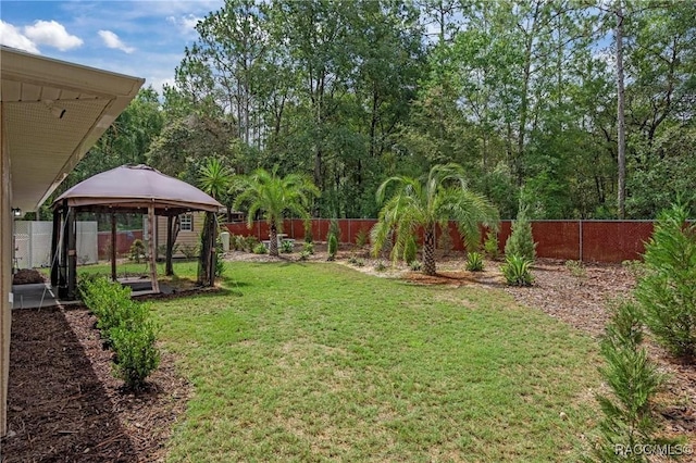 3224 E Davis Ln, Inverness, FL 34453 - fenced backyard featuring a gazebo