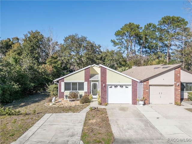 single story home featuring a garage