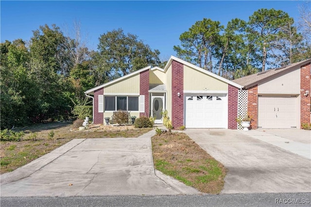 single story home with a garage