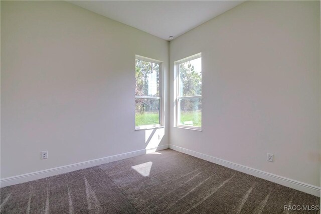 view of carpeted spare room