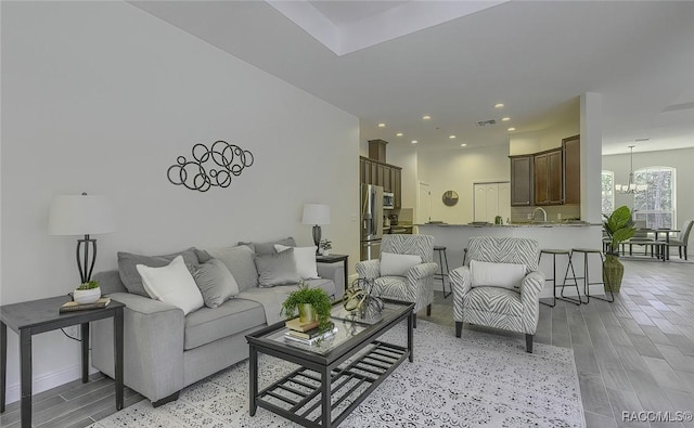 living room with a chandelier