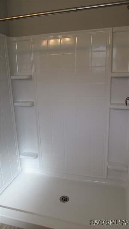 bathroom featuring walk in shower