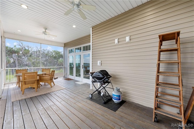 14211 W Saint Martins Rd, Crystal River, FL 34429 - sunroom / solarium with french doors, outdoor dining space, and a ceiling fan