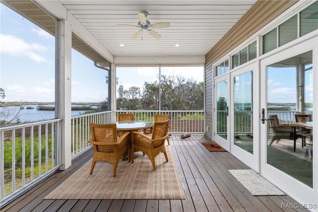 14211 W Saint Martins Rd, Crystal River, FL 34429 - sunroom with a water view, french doors, ceiling fan, and outdoor dining area