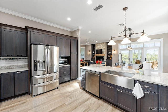 14211 W Saint Martins Rd, Crystal River, FL 34429 - kitchen with crown molding, visible vents, recessed lighting, and stainless steel appliances