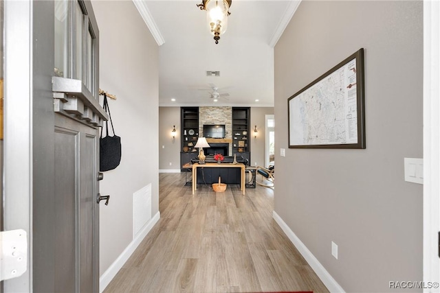 14211 W Saint Martins Rd, Crystal River, FL 34429 - foyer featuring light wood finished floors, visible vents, a ceiling fan, and crown molding