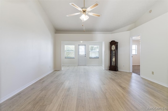 unfurnished living room with ceiling fan and light hardwood / wood-style floors