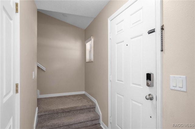 835 N Rembrandt Way, Inverness, FL 34453 - stairway featuring vaulted ceiling and carpet flooring