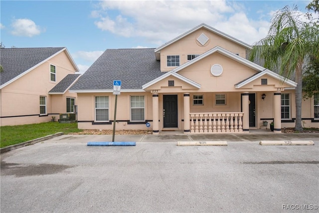 835 N Rembrandt Way, Inverness, FL 34453 - view of front of home featuring uncovered parking, roof with shingles, and stucco siding