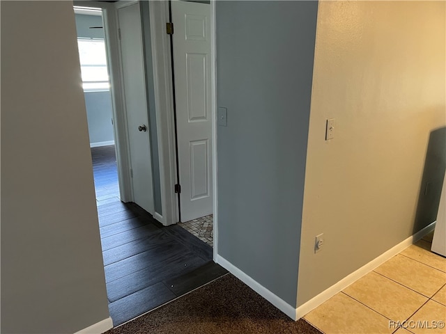 hallway featuring hardwood / wood-style floors